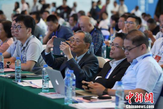 研討會現(xiàn)場圖?！■暮陚?攝